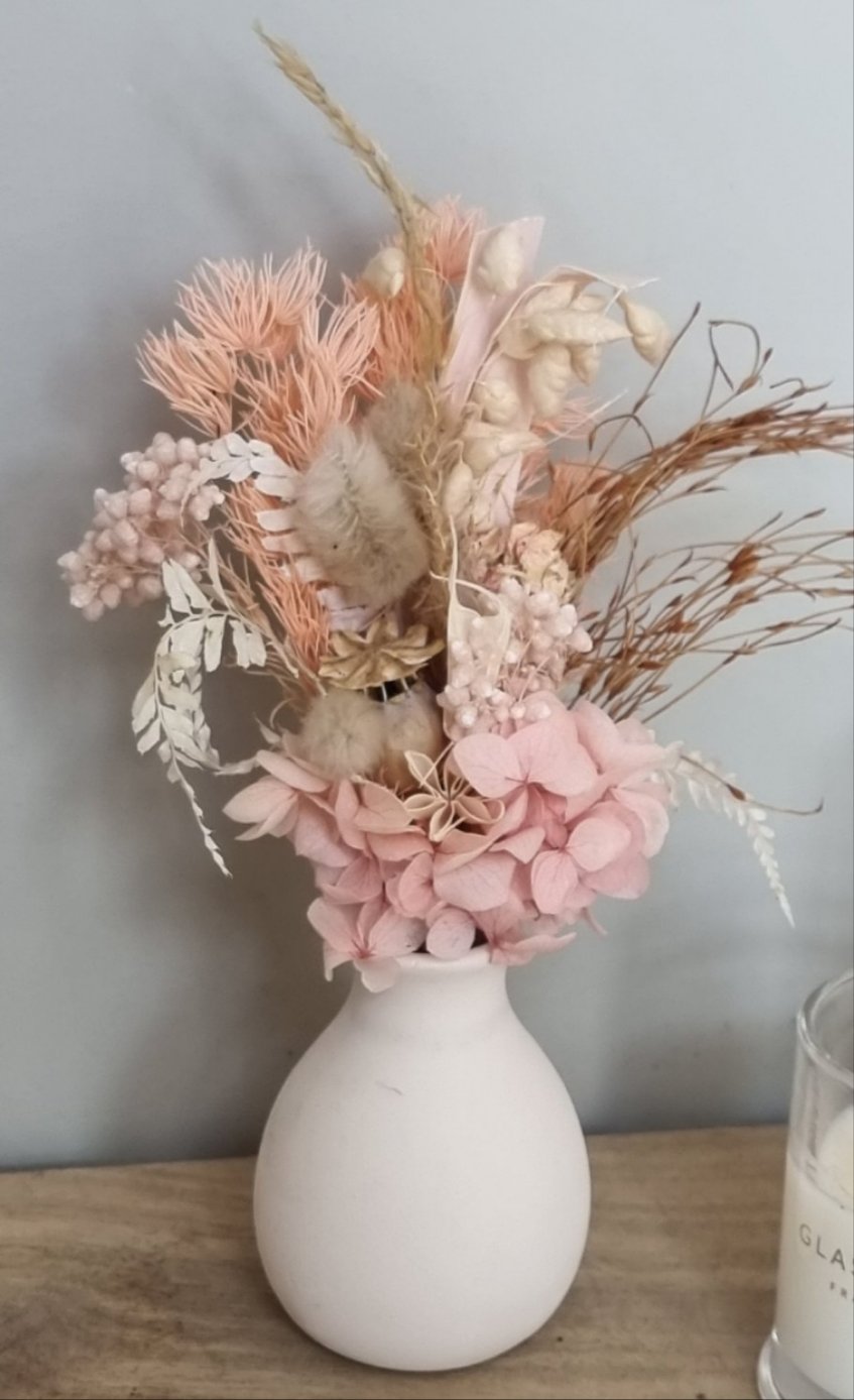 Dried floral arrangement in vase