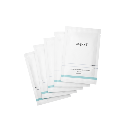 Stack of Aspect skincare sheet masks on a white background