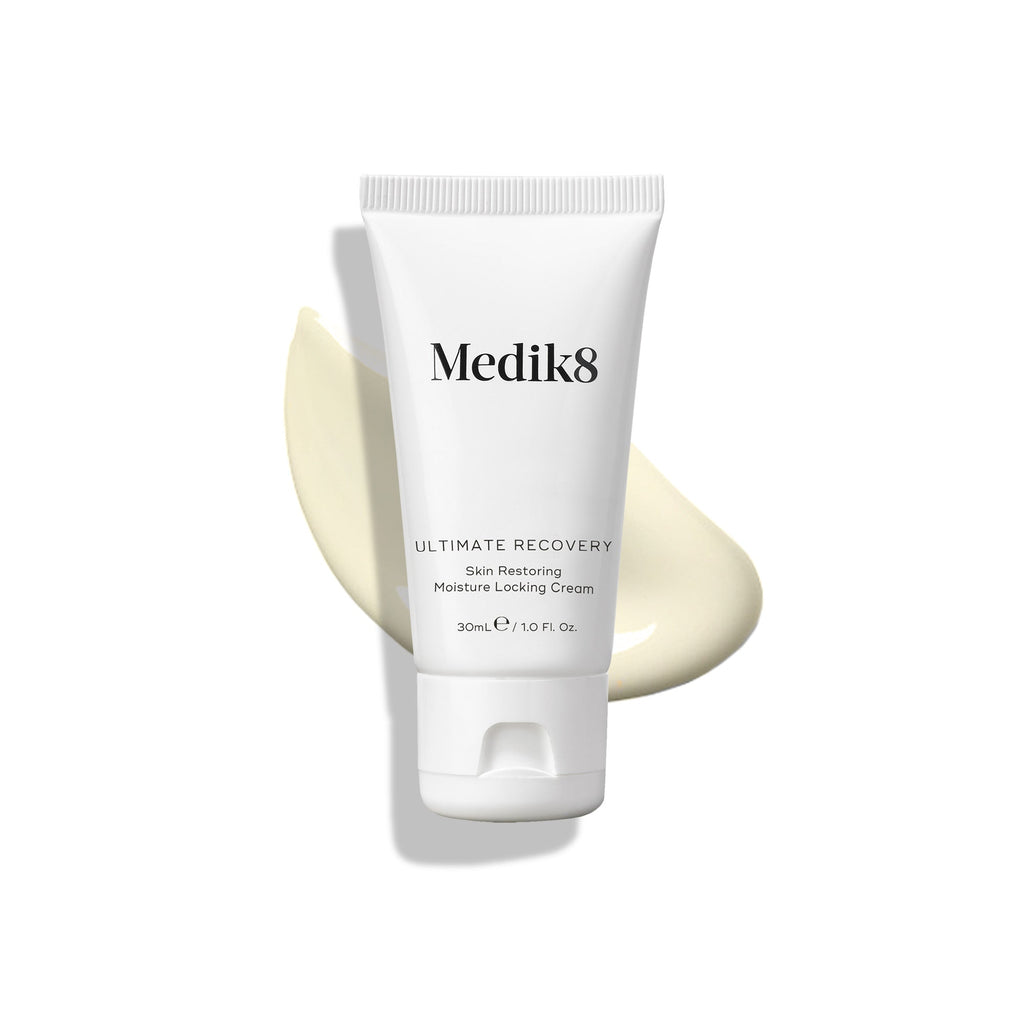 Medik8 skincare cream tube on a white background