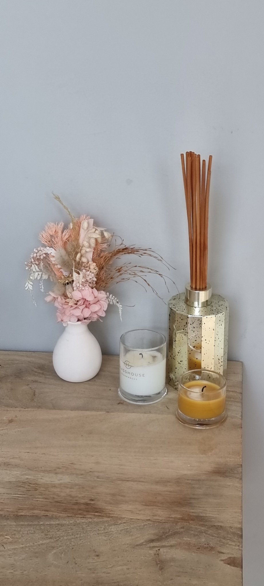 Dried floral arrangement in vase - Exquisite Laser Clinic