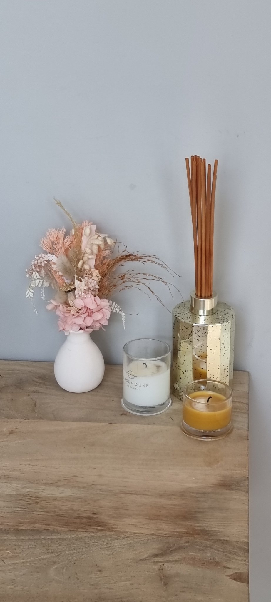 Dried floral arrangement in vase - Exquisite Laser Clinic
